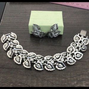 Signed CORO bracelet & matching earrings. Rhodium plated, delicate leaf pattern.